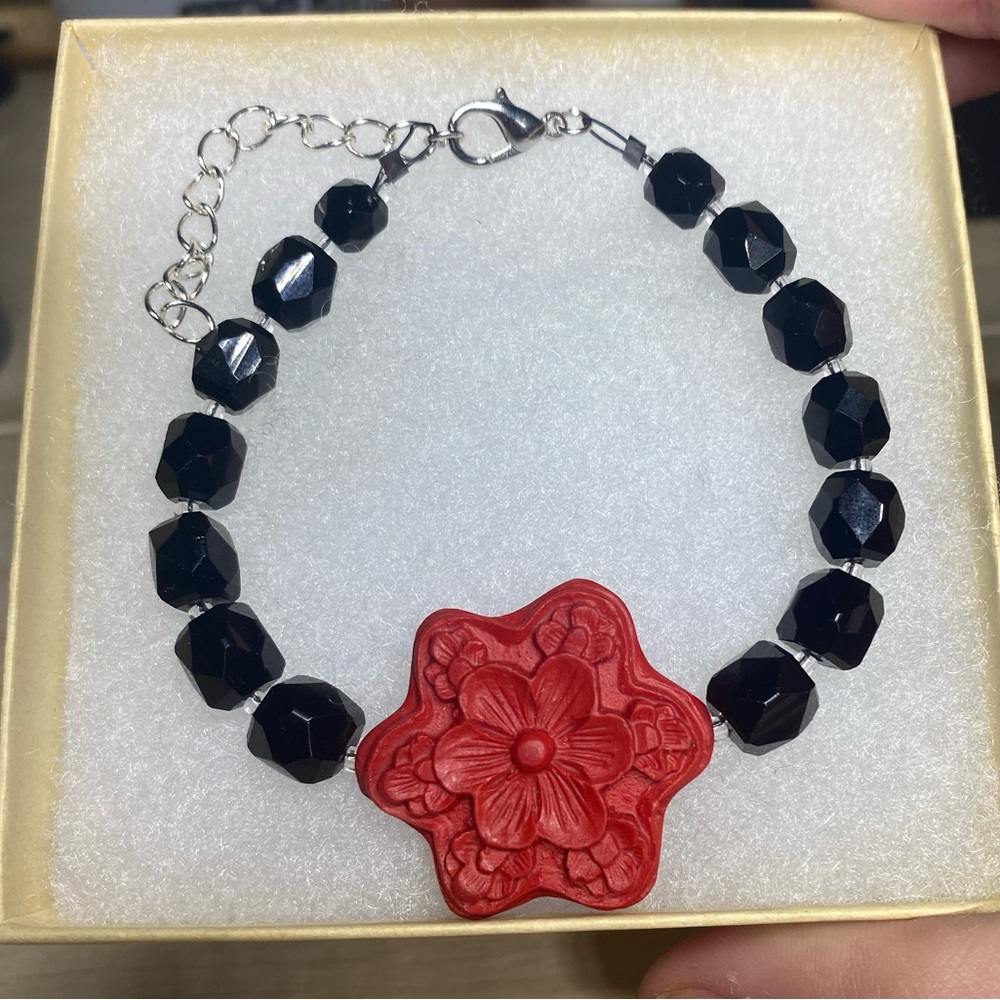 Handmade faux cinnabar and black glass bracelet